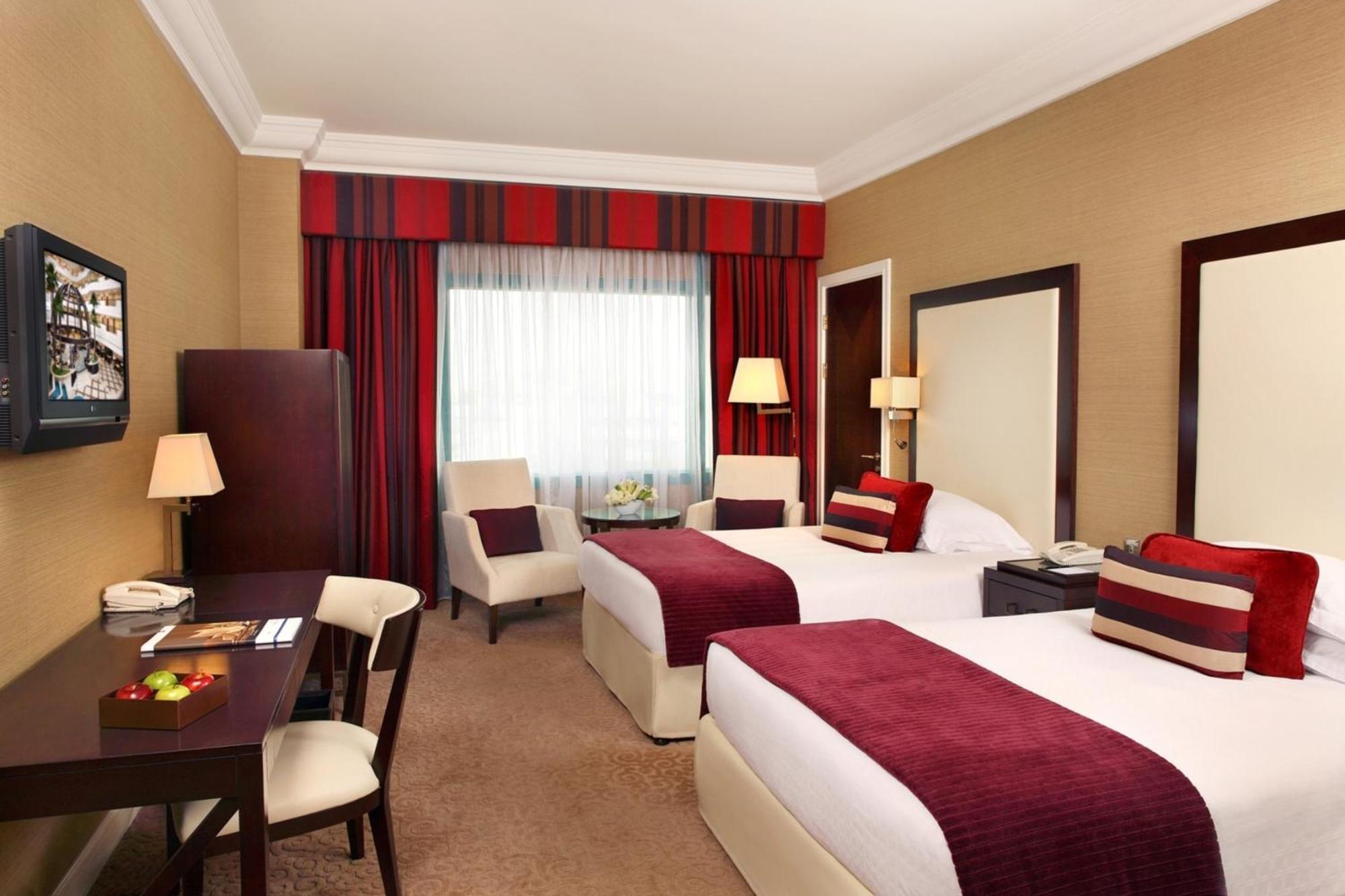 Mövenpick Grand Al Bustan Hotell Dubai Exteriör bild A room at the InterContinental London Park Lane