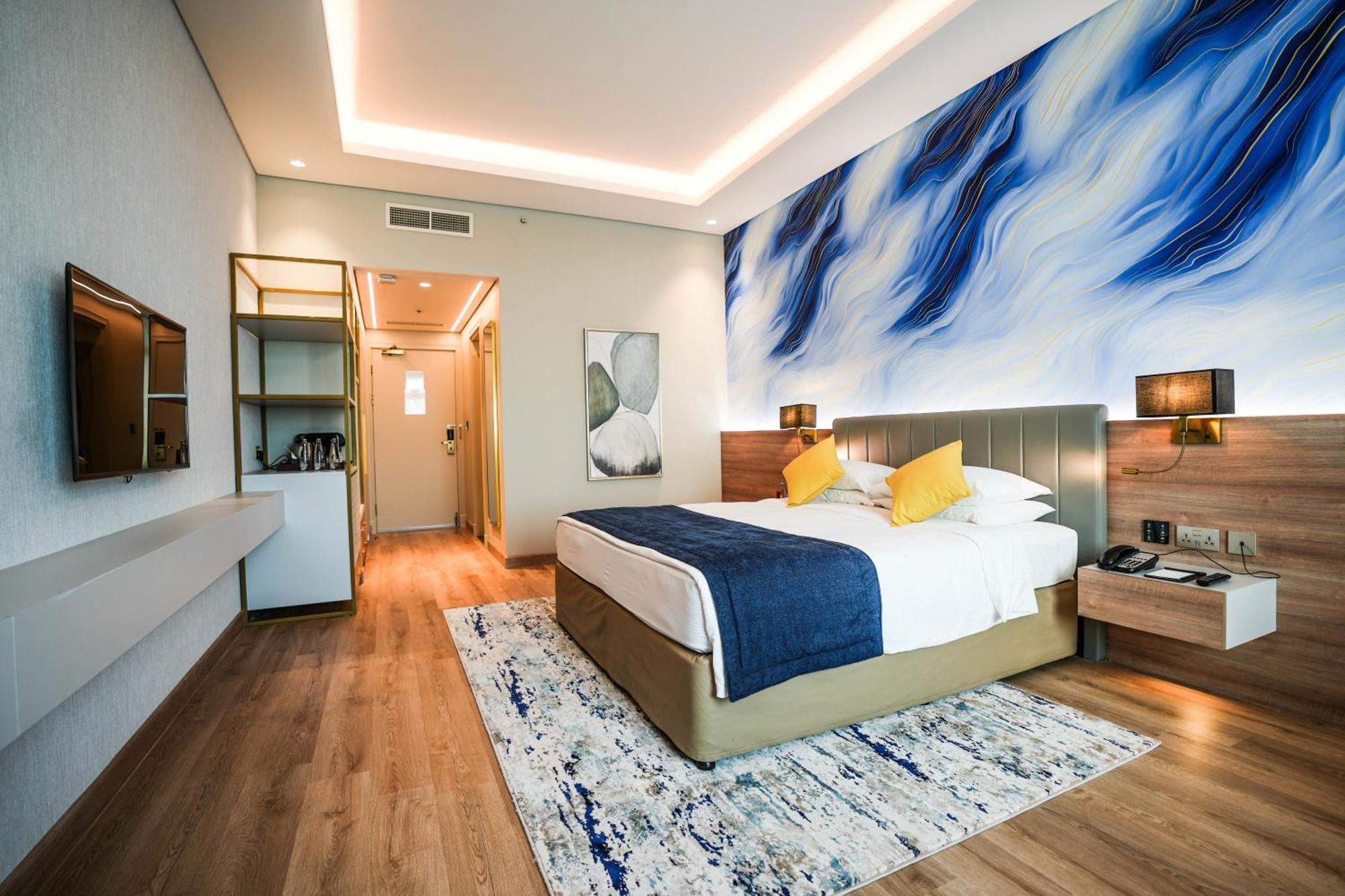 Mövenpick Grand Al Bustan Hotell Dubai Exteriör bild Deluxe Room